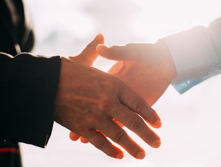 Commercial Real Estate Women Miami Tri-County - people shaking hands close-up